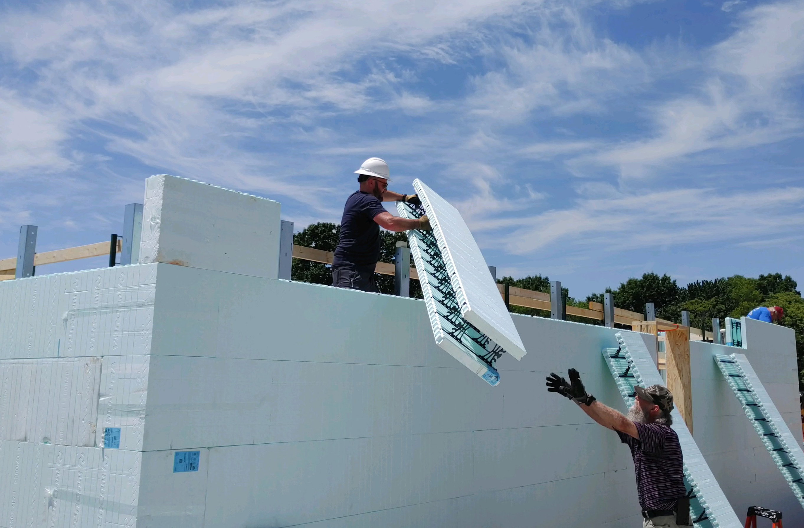 foam block being moved on icf house